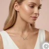 Gemini_Generated_Image_9fgy409fgy409fgy.webp Altın Yaldızlı Sonsuzluk Gümüş Kadın Kolye