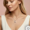 Gemini_Generated_Image_btrjzybtrjzybtrj.webp Pembe Çiçek Kadın Gümüş Kolye Modeli