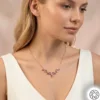 Gemini_Generated_Image_kg8knmkg8knmkg8k.webp Mor Geyik Boynuzu Kadın Gümüş Kolye Modeli