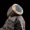 dokulu-blue-topaz-5c8d-1.webp Dokulu Blue Topaz Taşlı Gümüş Erkek Yüzük